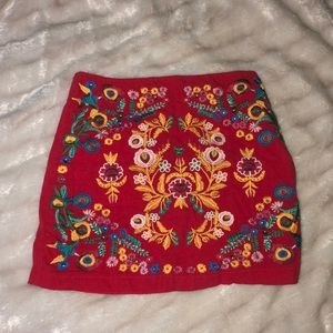 Red floral design altar’d state skirt